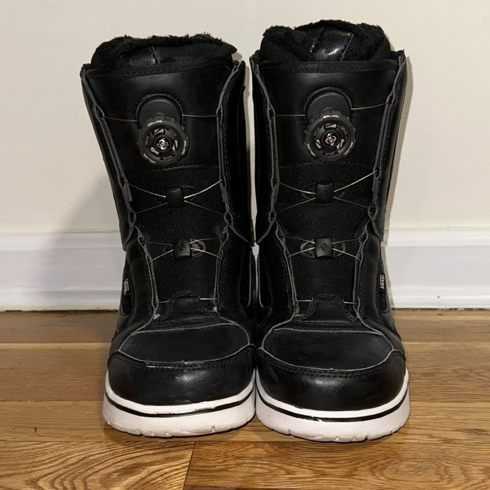 Snowboard boots by Vans. Helmet by Smith.